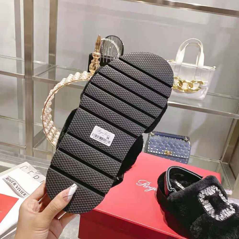 Roger Vivier Viv' Winter Fur Strass Buckle Sandals in Sheepskin for Women in Black Roger Vivier Viv' Winter Fur Strass Buckle Sandals in Sheepskin for Women in Black