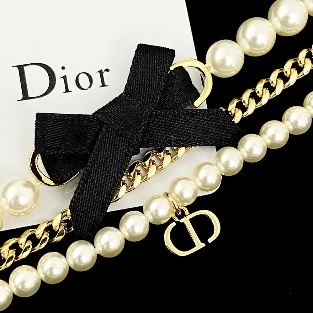 Dior Le Nœud de Dior Bracelet Gold-Finish Metal with White Resin Pearls and Black Satin for Women Dior Le Nœud de Dior Bracelet Gold-Finish Metal with White Resin Pearls and Black Satin for Women