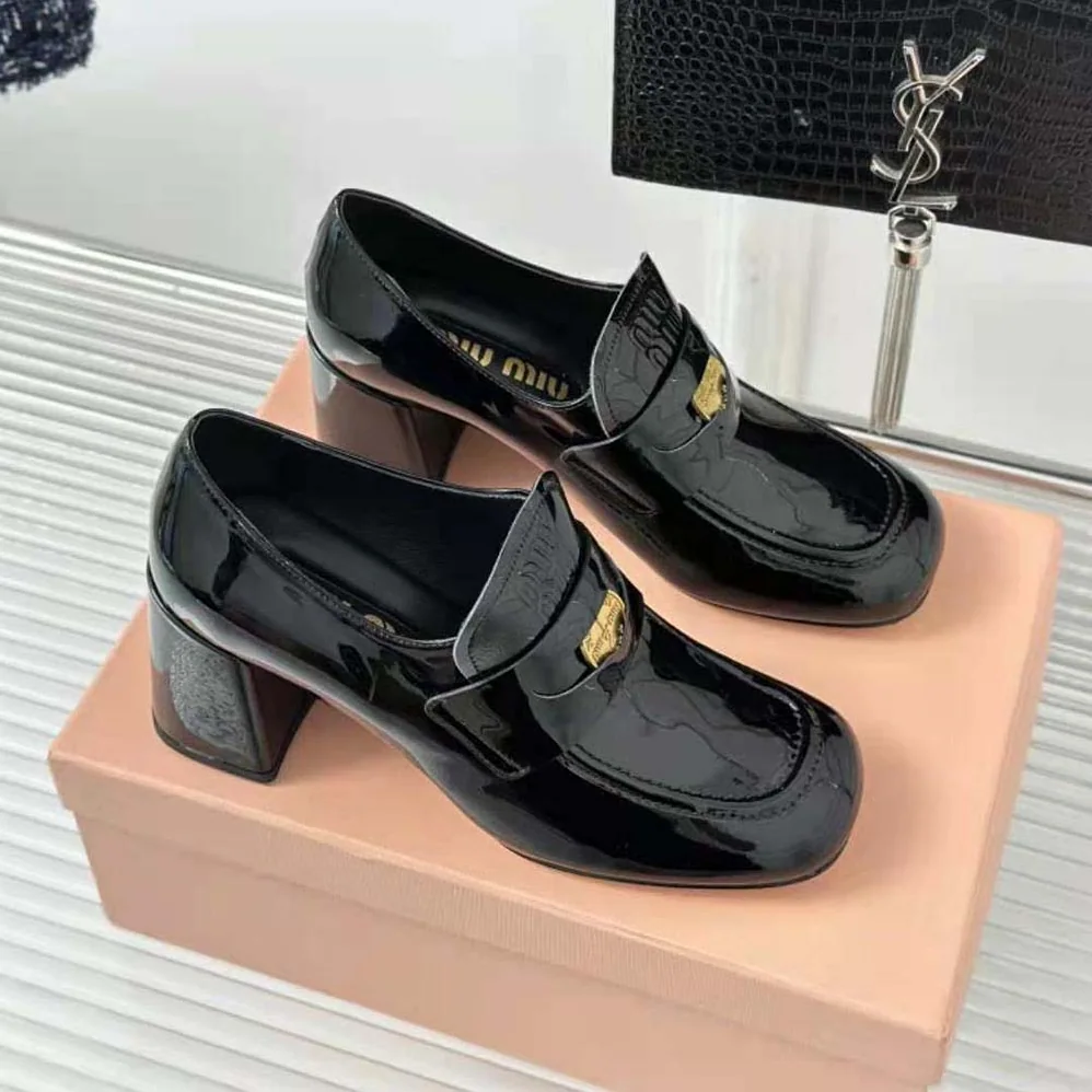 Miu Miu Patent Leather Loafers with Embossed Logo on the Tongue for Women in Black Miu Miu Patent Leather Loafers with Embossed Logo on the Tongue for Women in Black