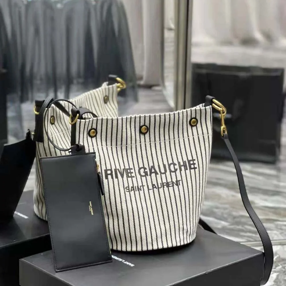 Saint Laurent YSL Rive Gauche Bucket Bag in Striped Canvas and Leather for Women Saint Laurent YSL Rive Gauche Bucket Bag in Striped Canvas and Leather for Women