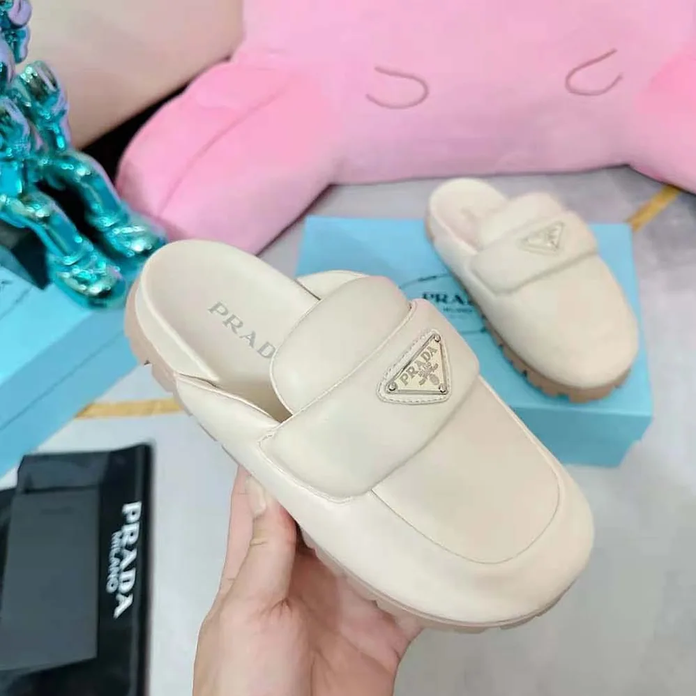 Prada Soft Padded Nappa Leather Sabots for Women in Beige Prada Soft Padded Nappa Leather Sabots for Women in Beige