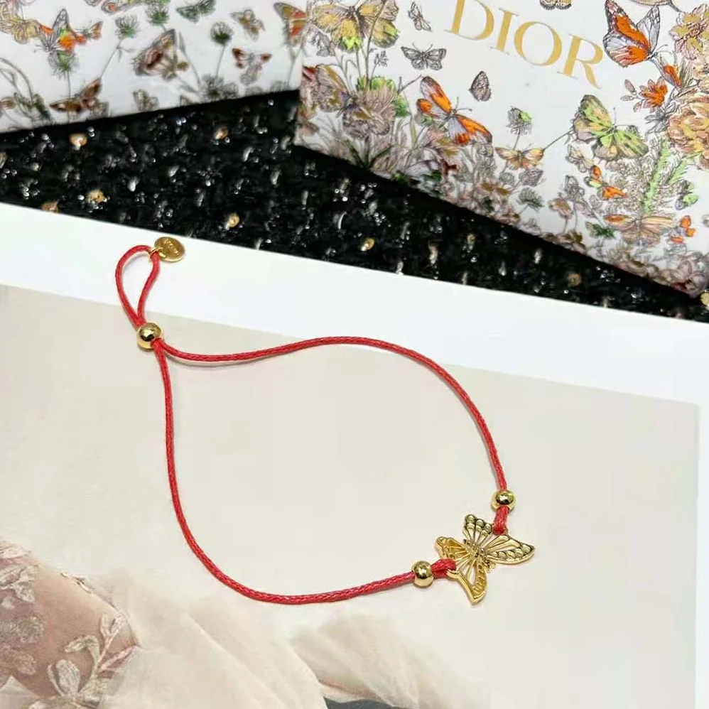 Dior Diorelita Bracelet Gold-Finish Metal and Red Cotton for Women Dior Diorelita Bracelet Gold-Finish Metal and Red Cotton for Women