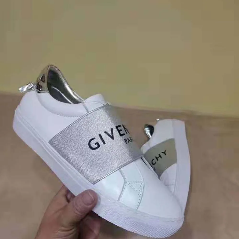 Givenchy Givenchy Paris Metallized Strap Sneakers in Leather for Women in Silver