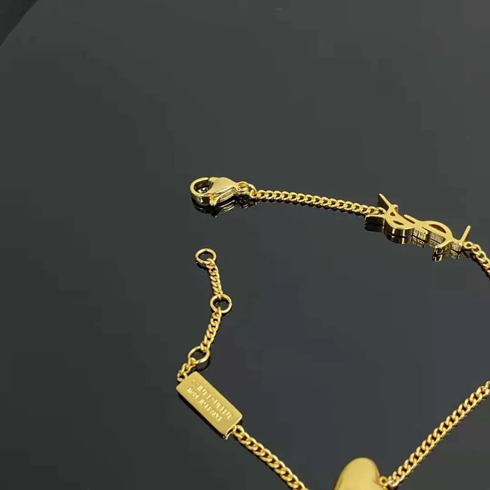 Saint Laurent YSL Opyum Heart Charm Bracelet in Metal for Women