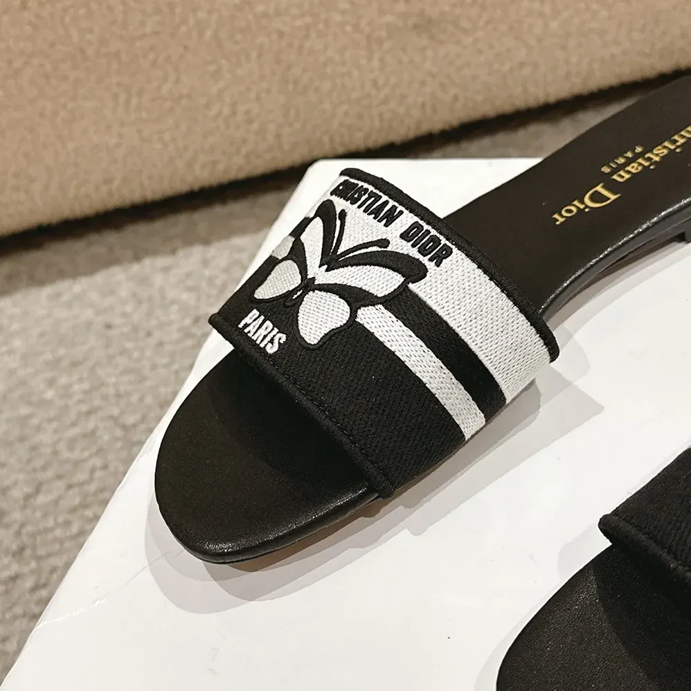 Dior Dway Slide Black and White Cotton Embroidered with Christian Dior Papillon Motif for Women Dior Dway Slide Black and White Cotton Embroidered with Christian Dior Papillon Motif for Women