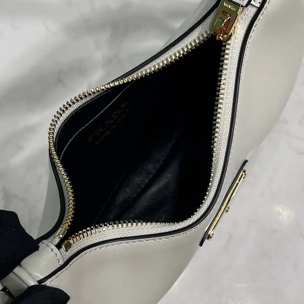 Prada Arqué Mini Leather Shoulder Bag for Women in White Prada Arqué Mini Leather Shoulder Bag for Women in White