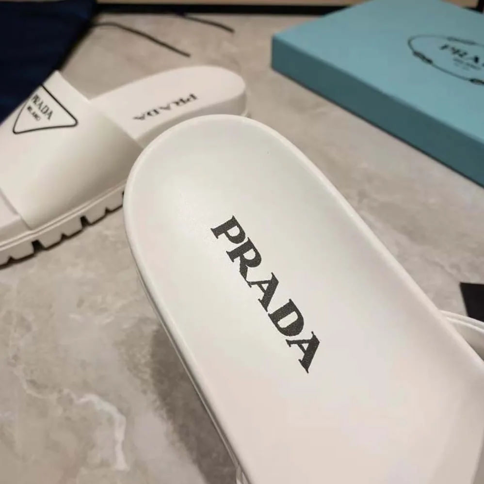 Prada Leather Slides in 20mm Heel for Women in White Prada Leather Slides in 20mm Heel for Women in White