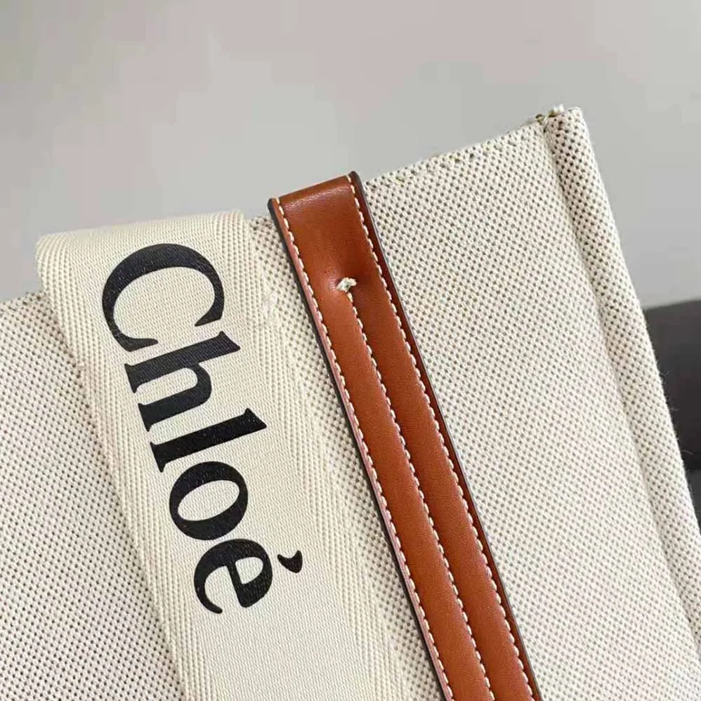 Chloe Large Woody Tote Bag in Linen Canvas and Shiny Calfskin with Woody Ribbon for Women Chloe Large Woody Tote Bag in Linen Canvas and Shiny Calfskin with Woody Ribbon for Women