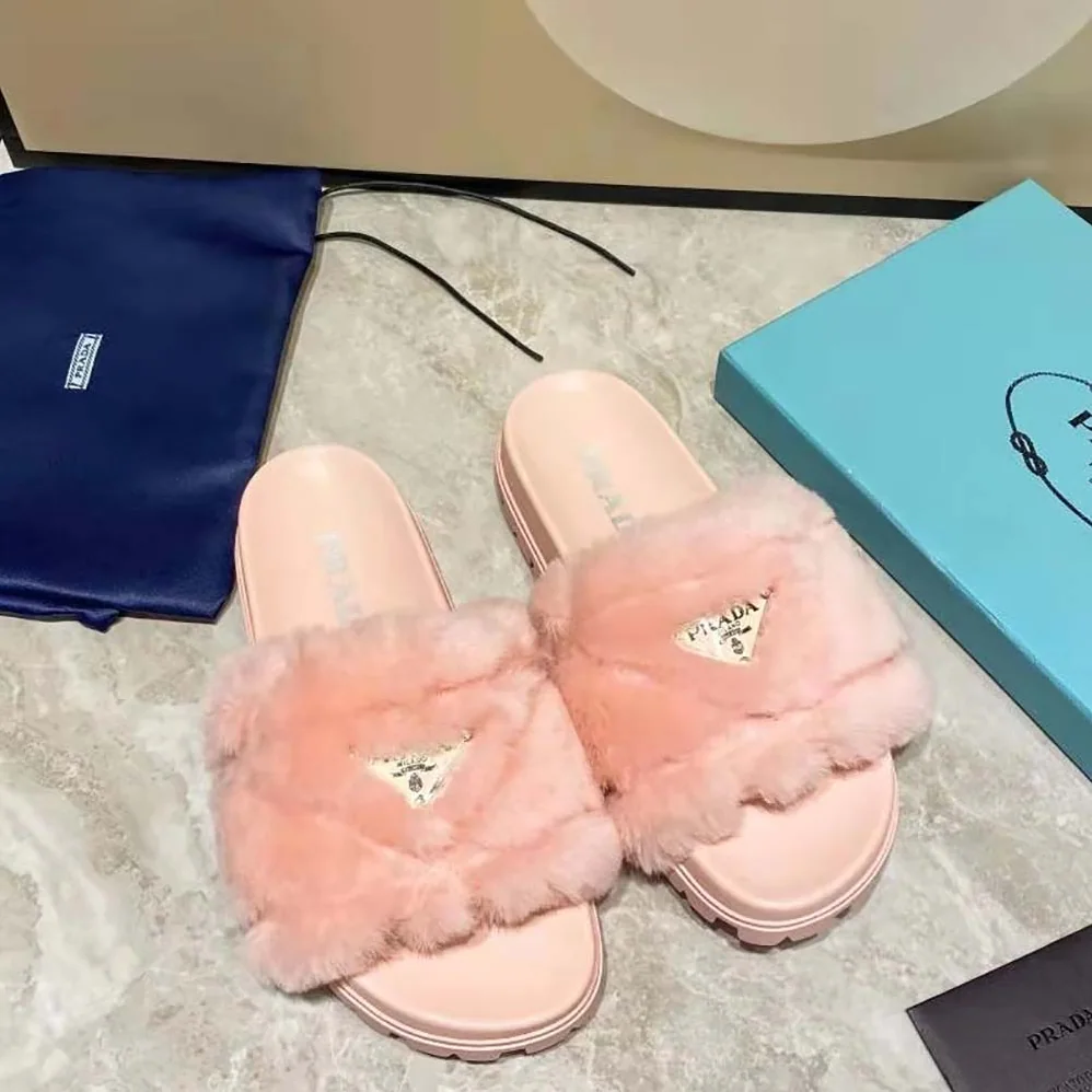 Prada Shearling Slides in 20mm Heel for Women in Pink Prada Shearling Slides in 20mm Heel for Women in Pink