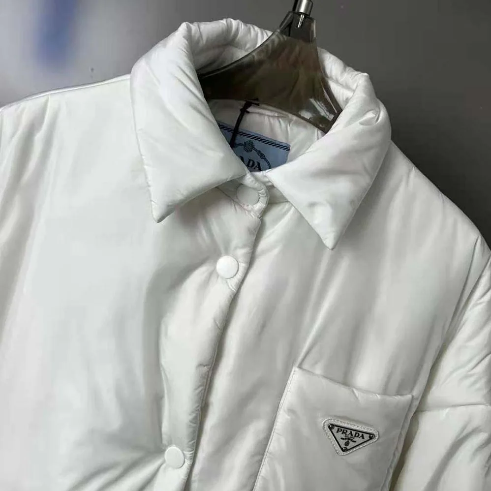 Prada Light Re-Nylon Padded Jacket for Women in White Prada Light Re-Nylon Padded Jacket for Women in White