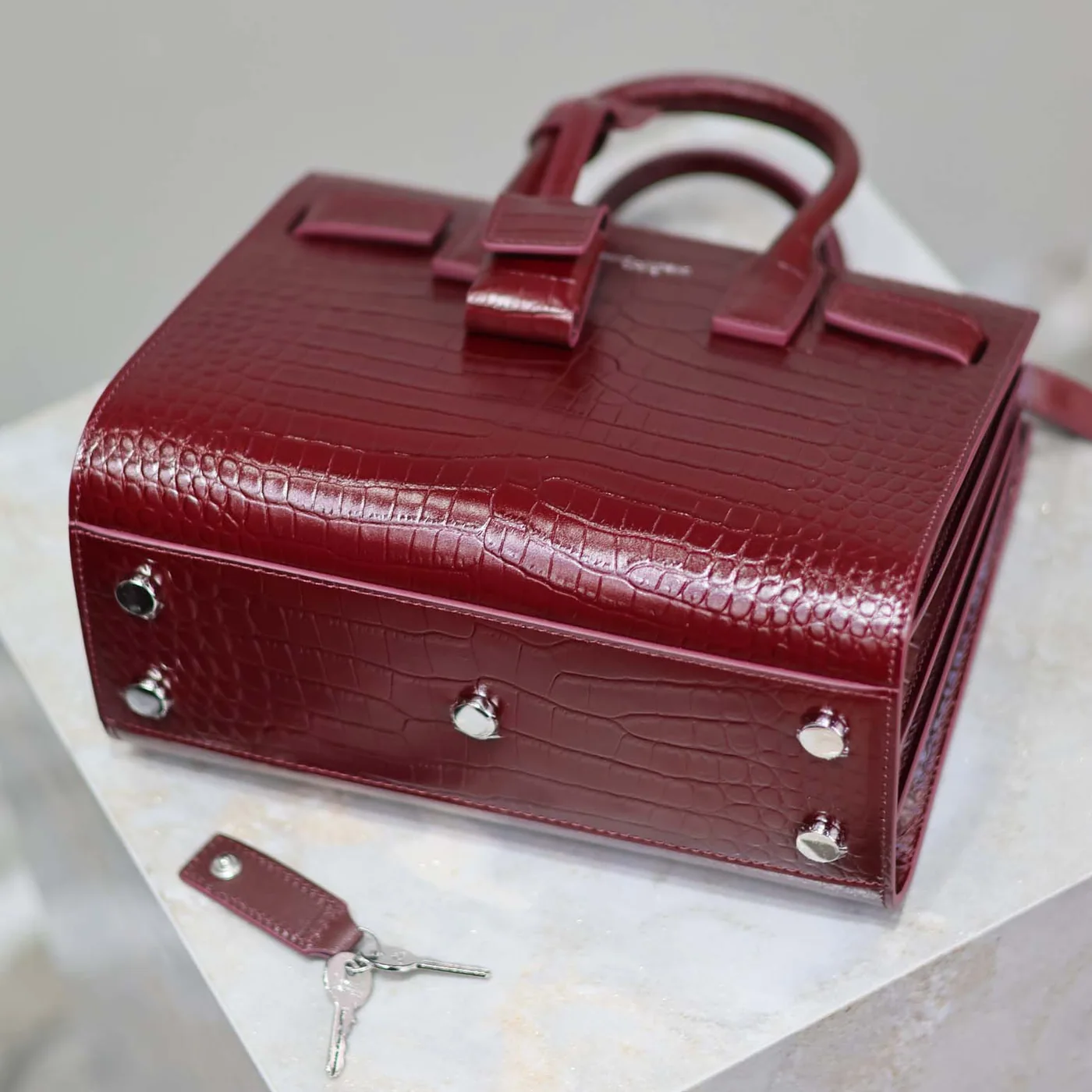 Saint Laurent YSL Sac De Jour in Crocodile Embossed Leather Nano for Women in Maroon Saint Laurent YSL Sac De Jour in Crocodile Embossed Leather Nano for Women in Maroon