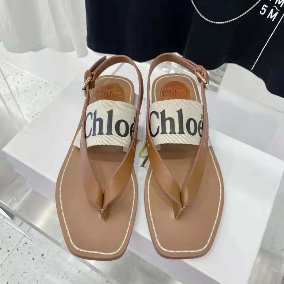 Chloe Woody Flat Sandal in Calfskin and Canvas for Women in White Chloe Woody Flat Sandal in Calfskin and Canvas for Women in White