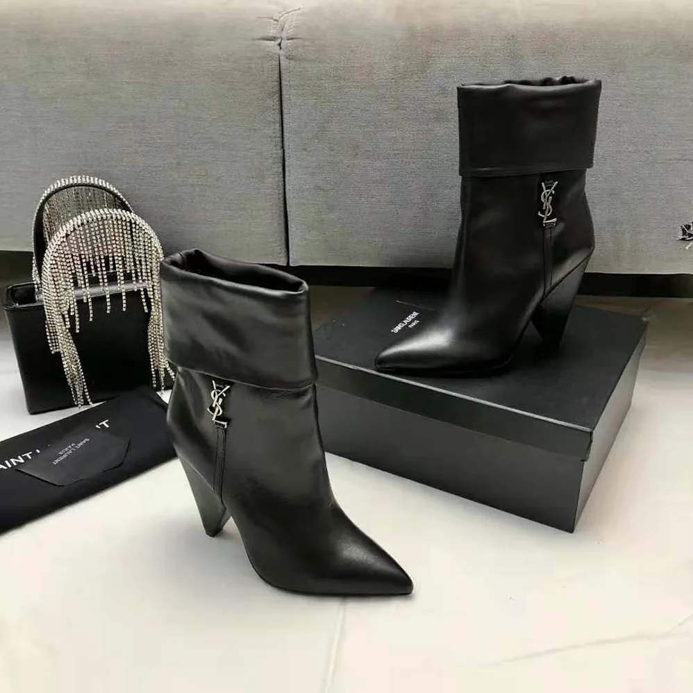 Saint Laurent YSL Niki Booties in Smooth Leather and Silver-Tone Monogram for Women in Black Saint Laurent YSL Niki Booties in Smooth Leather and Silver-Tone Monogram for Women in Black