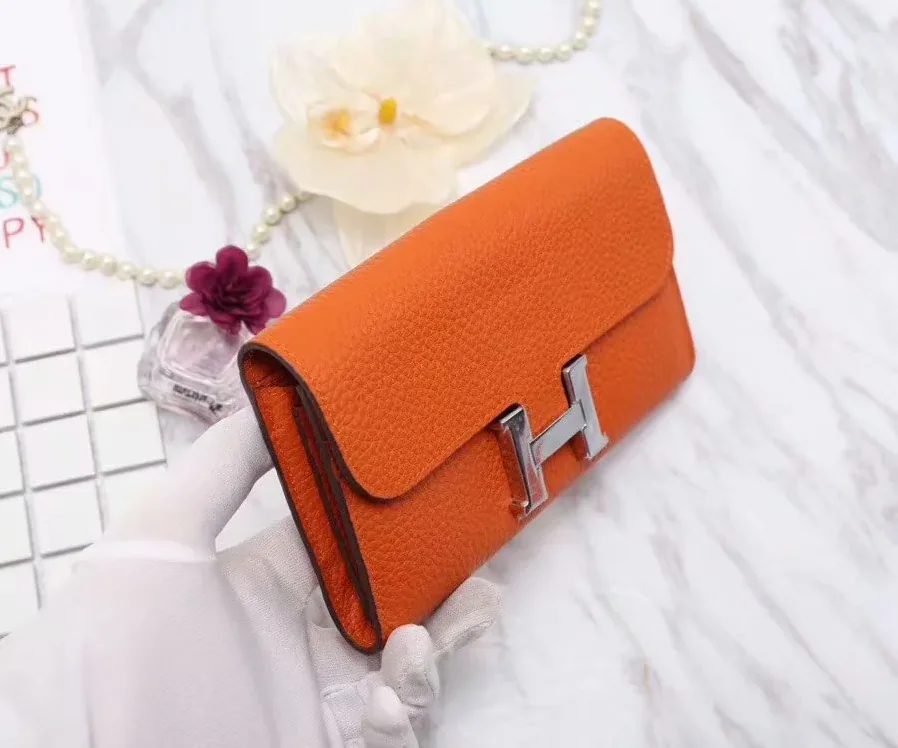 Hermes Constance Togo Long Wallet in Silver Toned Hardware Orange Hermes Constance Togo Long Wallet in Silver Toned Hardware Orange