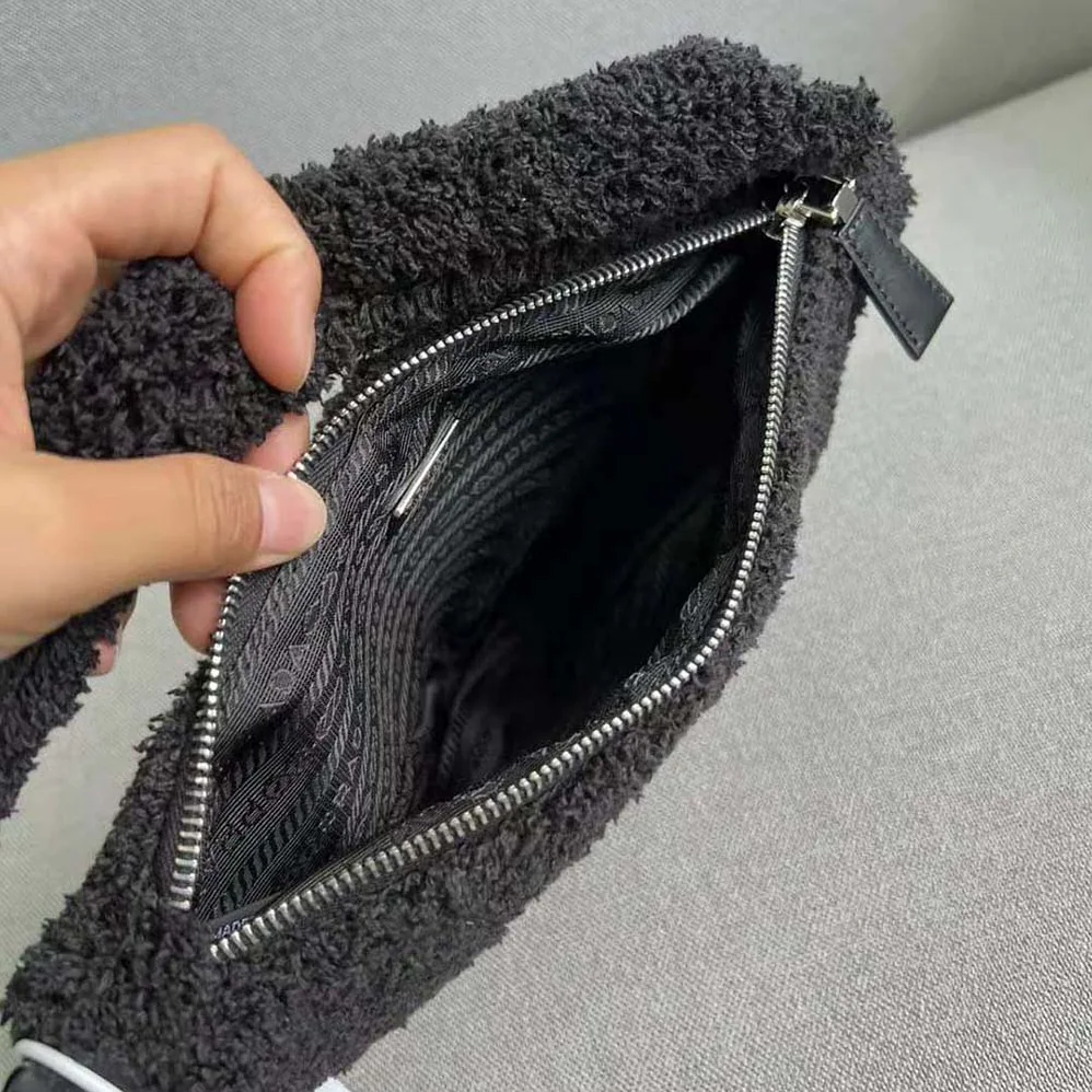 Prada Terrycloth Pouch with Embroidered Lettering Logo for Women in Black Prada Terrycloth Pouch with Embroidered Lettering Logo for Women in Black