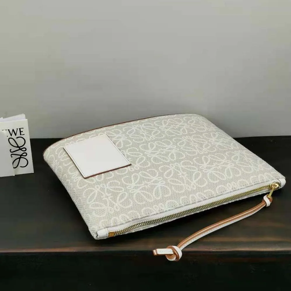 Loewe Oblong Anagram Pouch in Jacquard and Calfskin for Women in White Loewe Oblong Anagram Pouch in Jacquard and Calfskin for Women in White