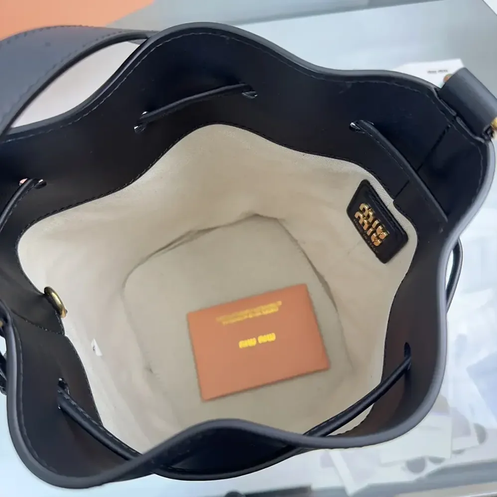 Miu Miu Leather Bucket Bag-Black 5BE090_2CRM_F0002_V_OOO for Women Miu Miu Leather Bucket Bag-Black 5BE090_2CRM_F0002_V_OOO for Women