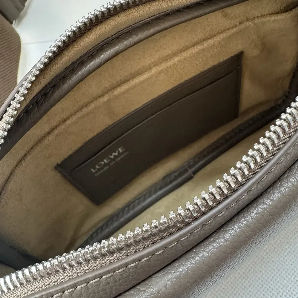 Loewe Small Pebble Messenger Bag in Supple Grained Calfskin for Unisex in Brown