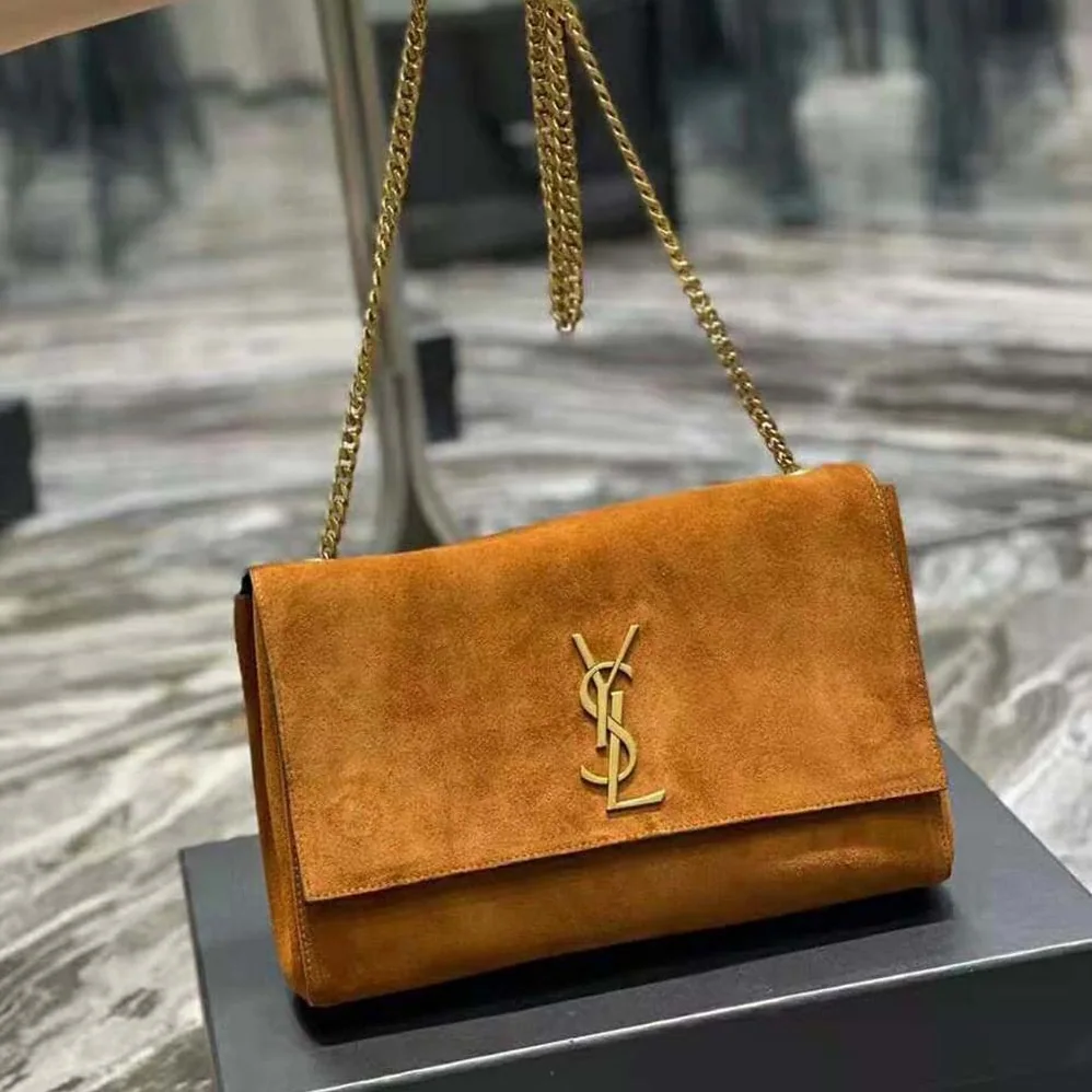 Saint Laurent YSL Kate Medium Reversible in Suede and Crocodile for Women in Embossed Leather Saint Laurent YSL Kate Medium Reversible in Suede and Crocodile for Women in Embossed Leather
