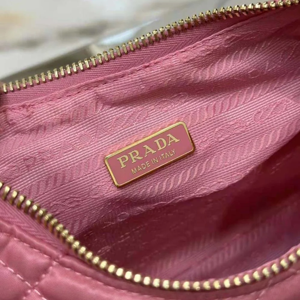 Prada Re-Edition 1995 Chaîne Re-Nylon Mini-bag for Women in Pink