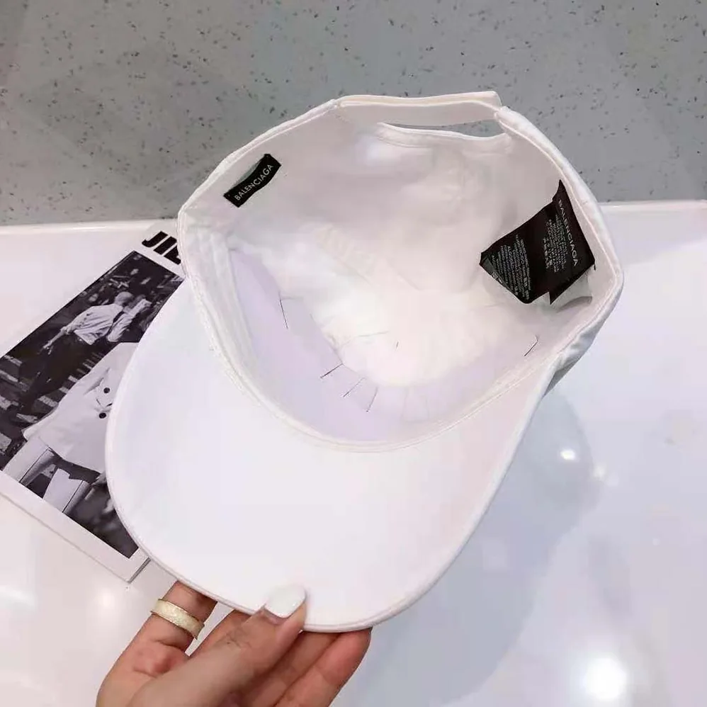 Balenciaga Logo Visor Cap in White and Black Cotton Drill for Women Balenciaga Logo Visor Cap in White and Black Cotton Drill for Women