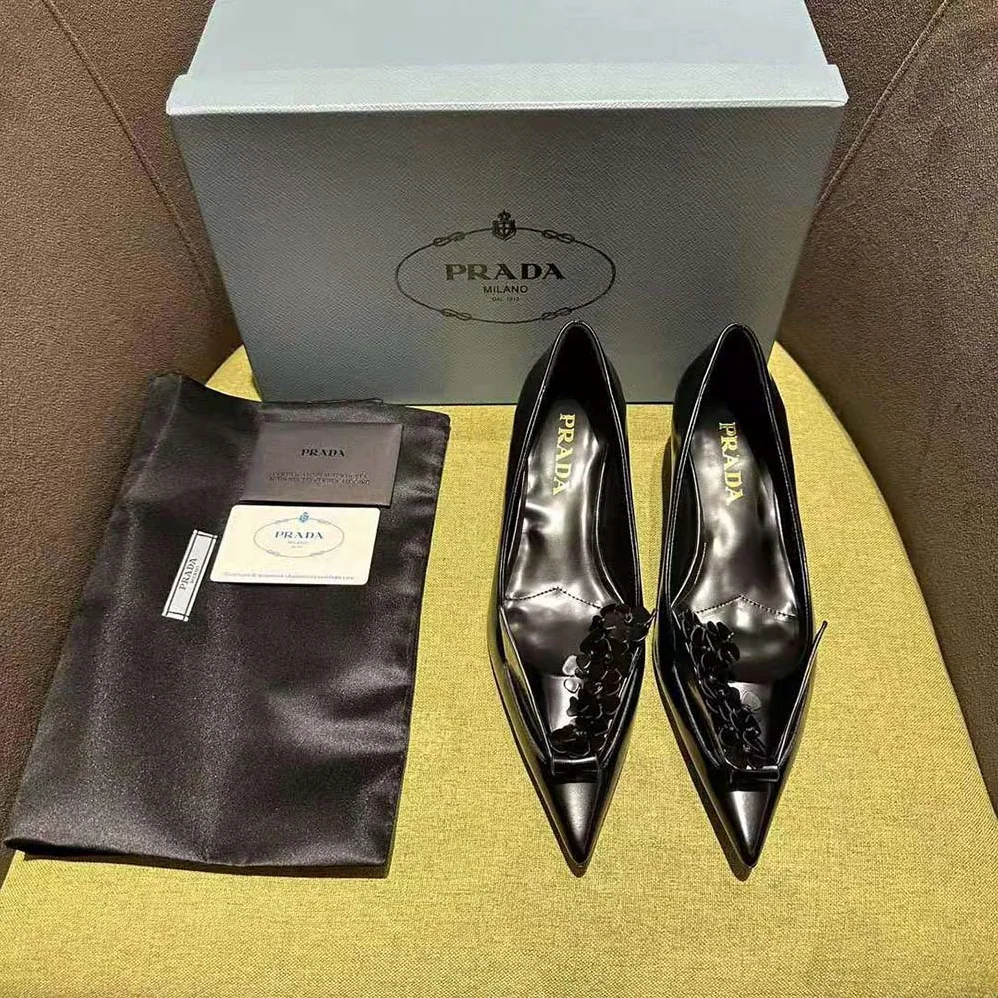 Prada Brushed Leather Pumps with Floral Appliqués for Women in Black