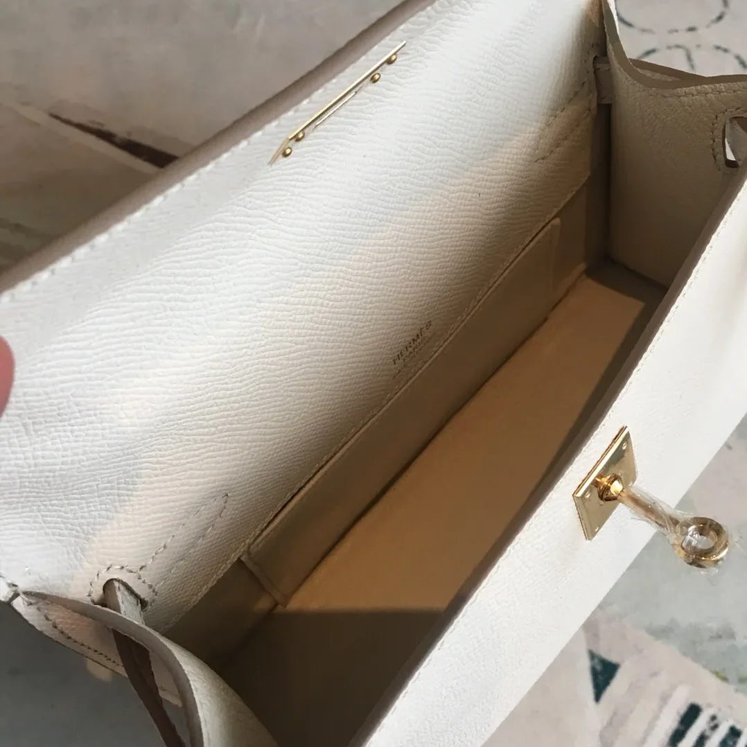 Hermes Kelly Pochettee White Gold Toned Hardware /