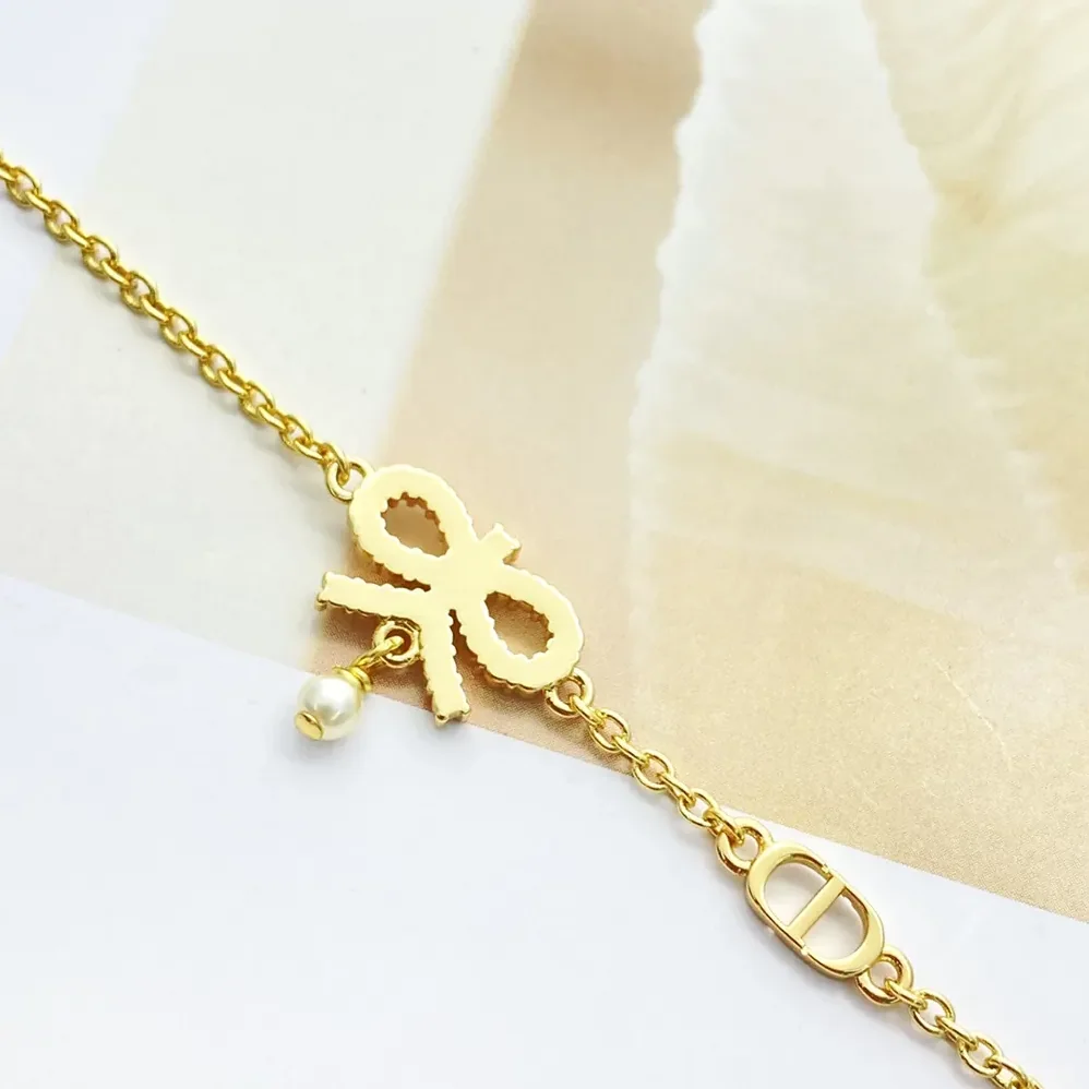Dior Le Nœud de Dior Necklace Gold-Finish Metal with White Resin Pearl and Silver for Women in Tone Crystals Dior Le Nœud de Dior Necklace Gold-Finish Metal with White Resin Pearl and Silver for Women in Tone Crystals
