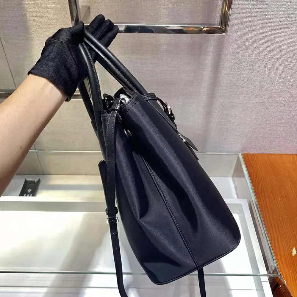 Prada Prada Double nylon and Saffiano Leather Bag for Women in Black