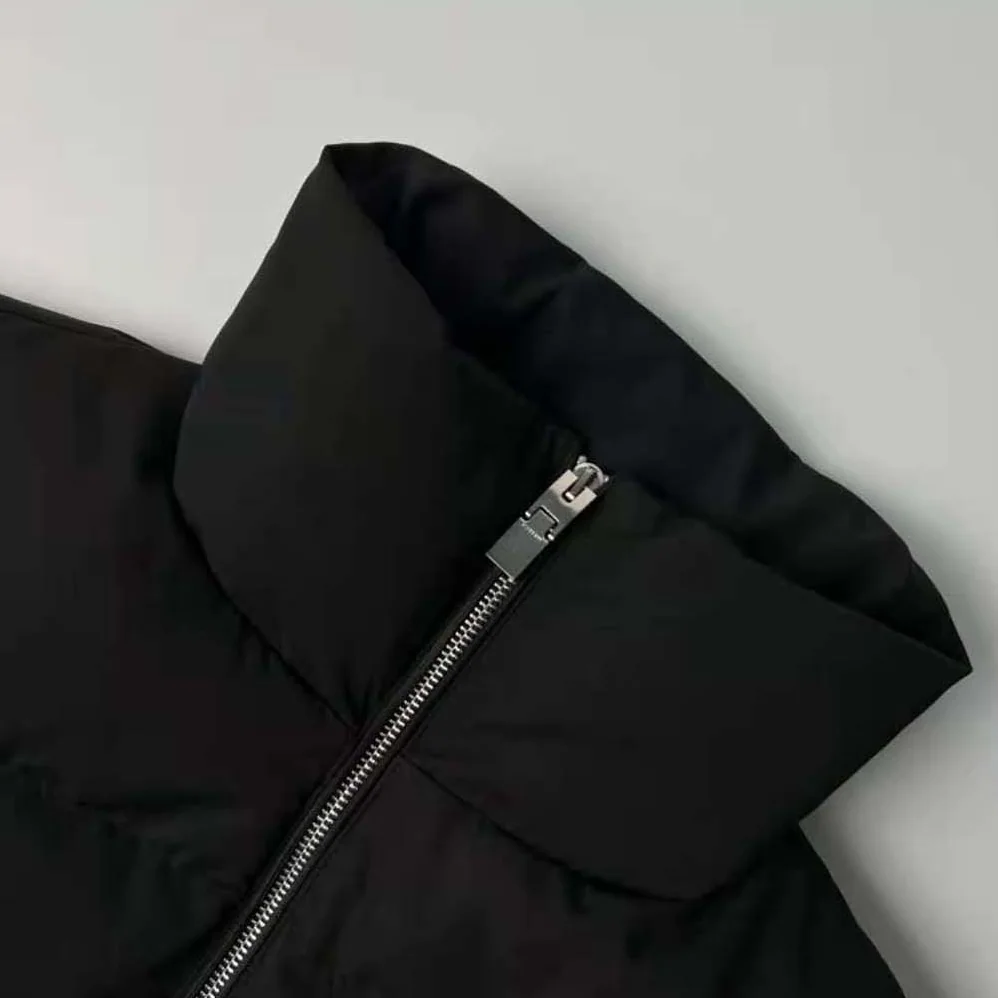 Givenchy Sleeveless Puffer Jacket with Metallic Details for Men Givenchy Sleeveless Puffer Jacket with Metallic Details for Men