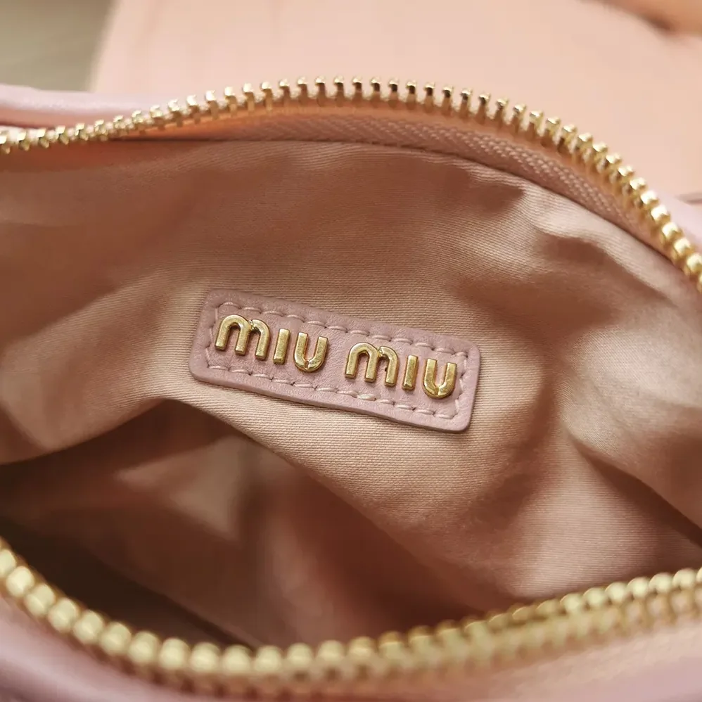 Miu Miu Wander Matelassé Nappa Leather Hobo Bag for Women in Alabaster Pink Miu Miu Wander Matelassé Nappa Leather Hobo Bag for Women in Alabaster Pink