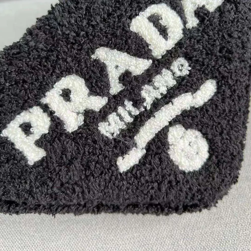 Prada Terrycloth Pouch with Embroidered Lettering Logo for Women in Black Prada Terrycloth Pouch with Embroidered Lettering Logo for Women in Black