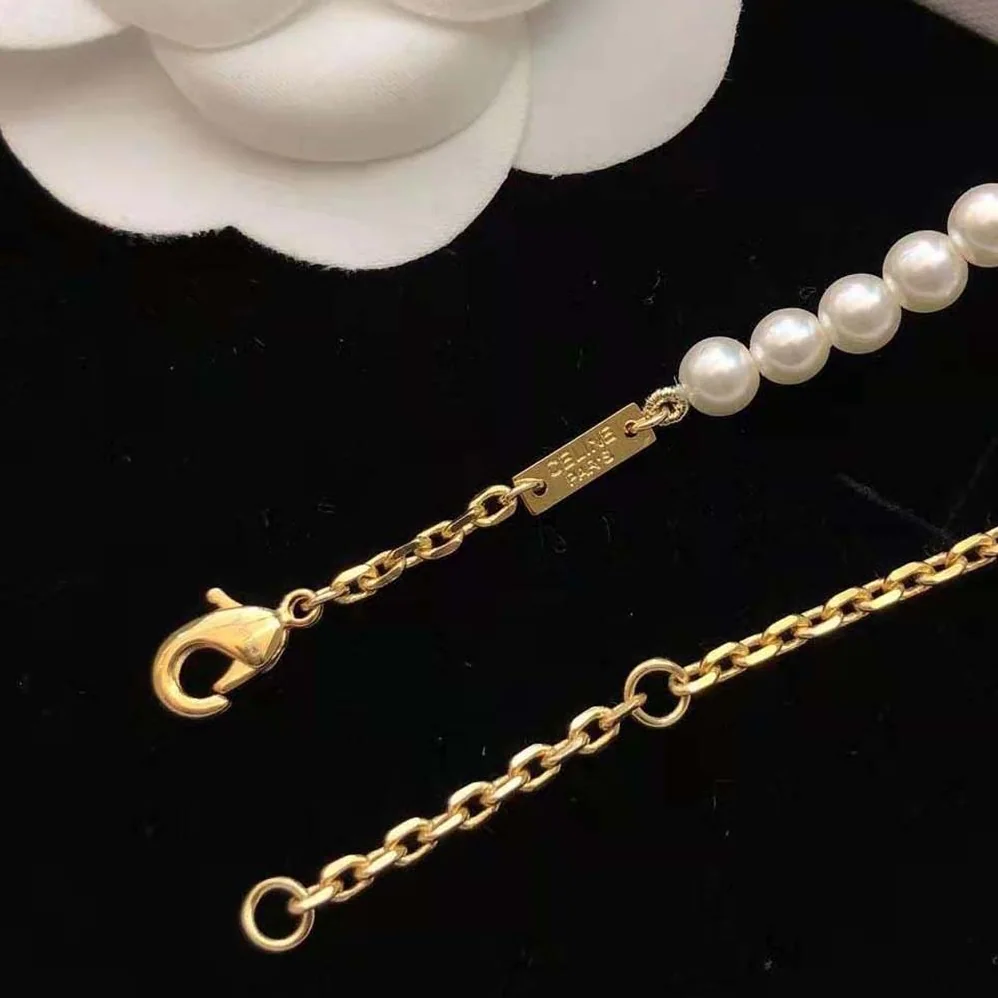Celine Paris Pearl Bracelet in Brass with Gold Finish and Glass Pearls for Women Celine Paris Pearl Bracelet in Brass with Gold Finish and Glass Pearls for Women