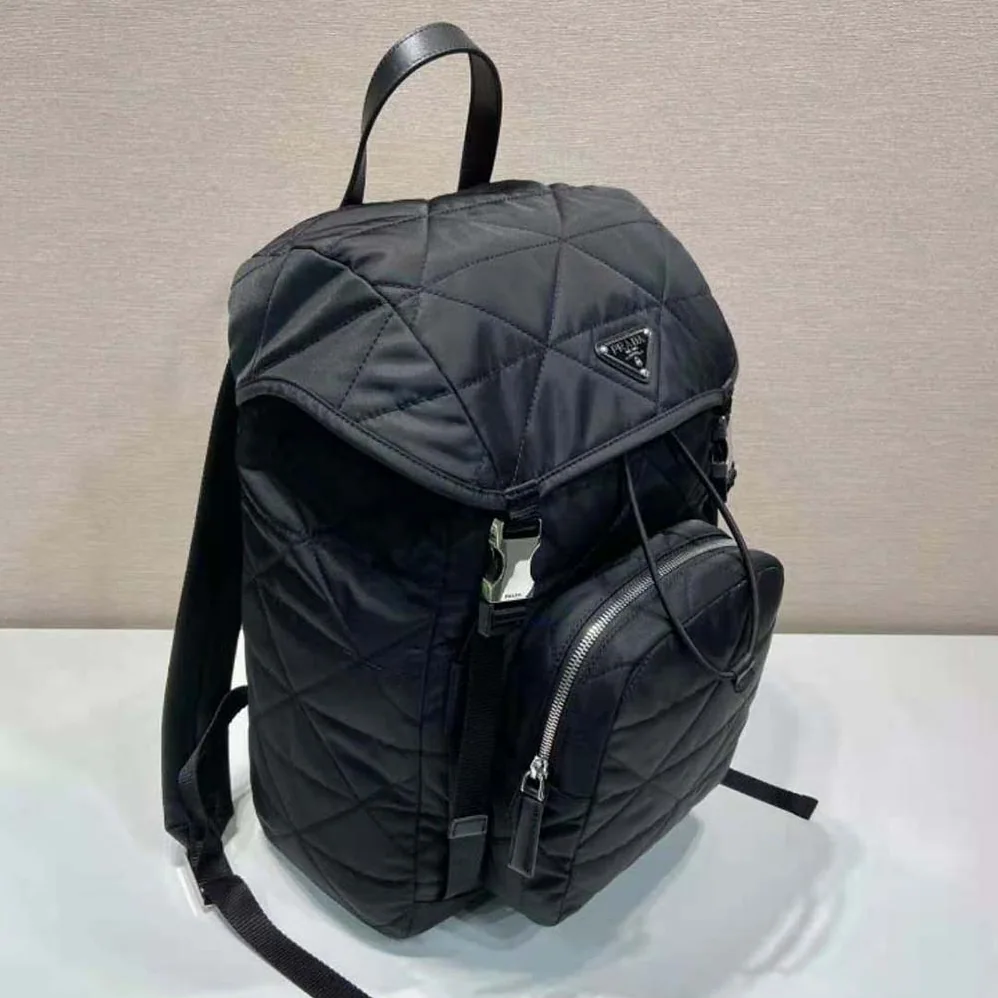 Prada Re-Nylon Backpack with Topstitching for Men in Black Prada Re-Nylon Backpack with Topstitching for Men in Black