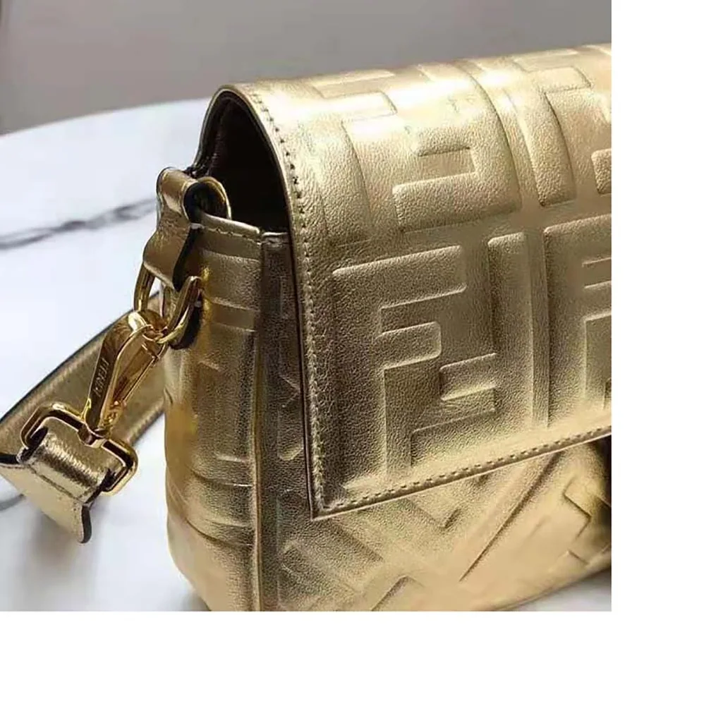 Fendi Baguette Fendi Prints On Leather Bag for Women in Gold Fendi Baguette Fendi Prints On Leather Bag for Women in Gold