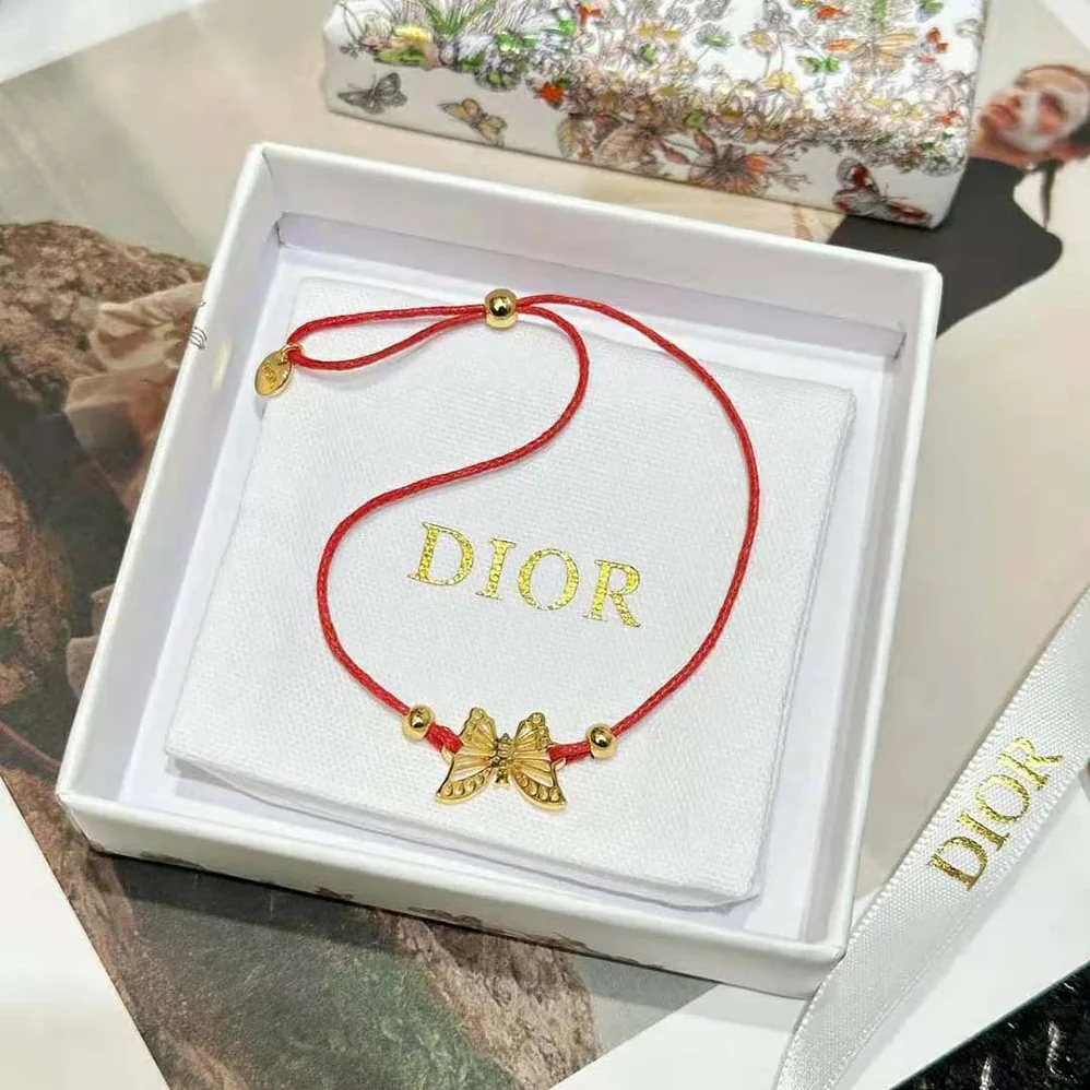 Dior Diorelita Bracelet Gold-Finish Metal and Red Cotton for Women Dior Diorelita Bracelet Gold-Finish Metal and Red Cotton for Women