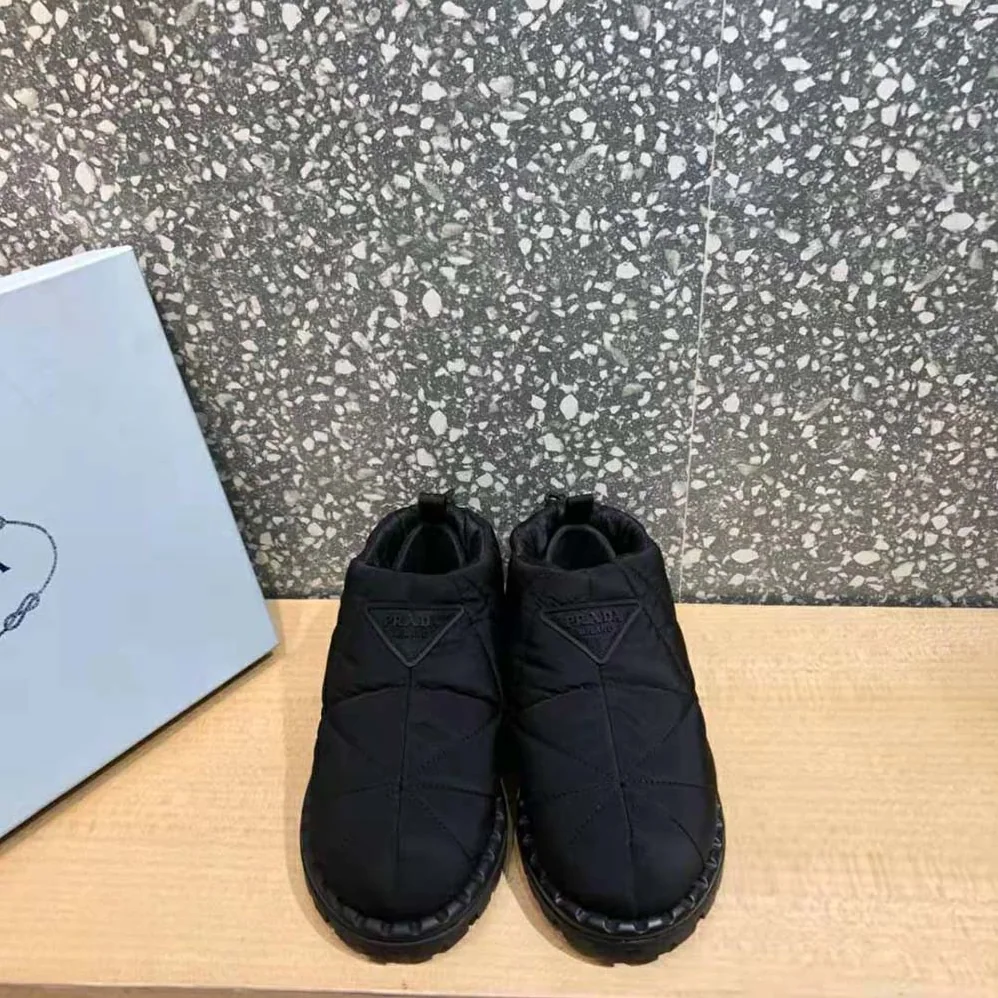 Prada Padded Nylon Slip-on Shoes for Women in Black Prada Padded Nylon Slip-on Shoes for Women in Black