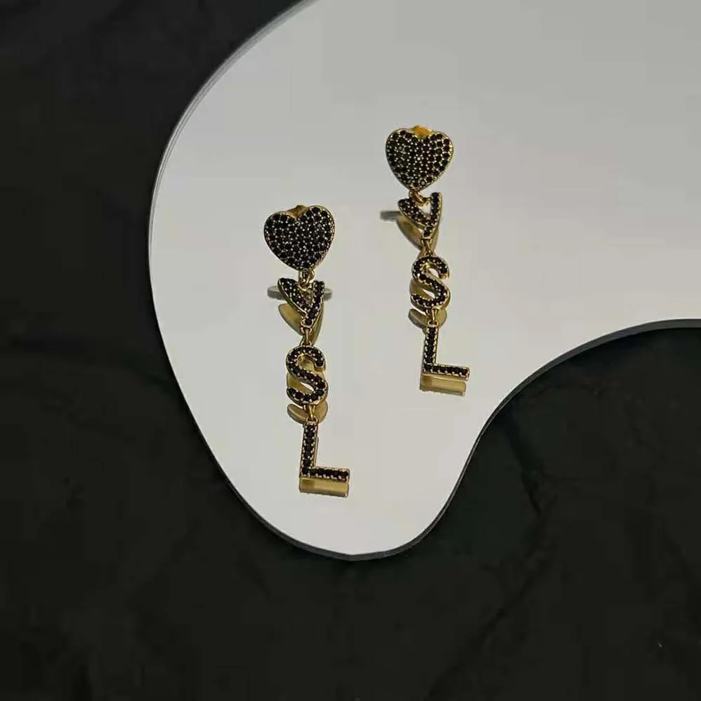Saint Laurent YSL Opyum YSL Heart Earrings in Metal and Crystal for Women Saint Laurent YSL Opyum YSL Heart Earrings in Metal and Crystal for Women