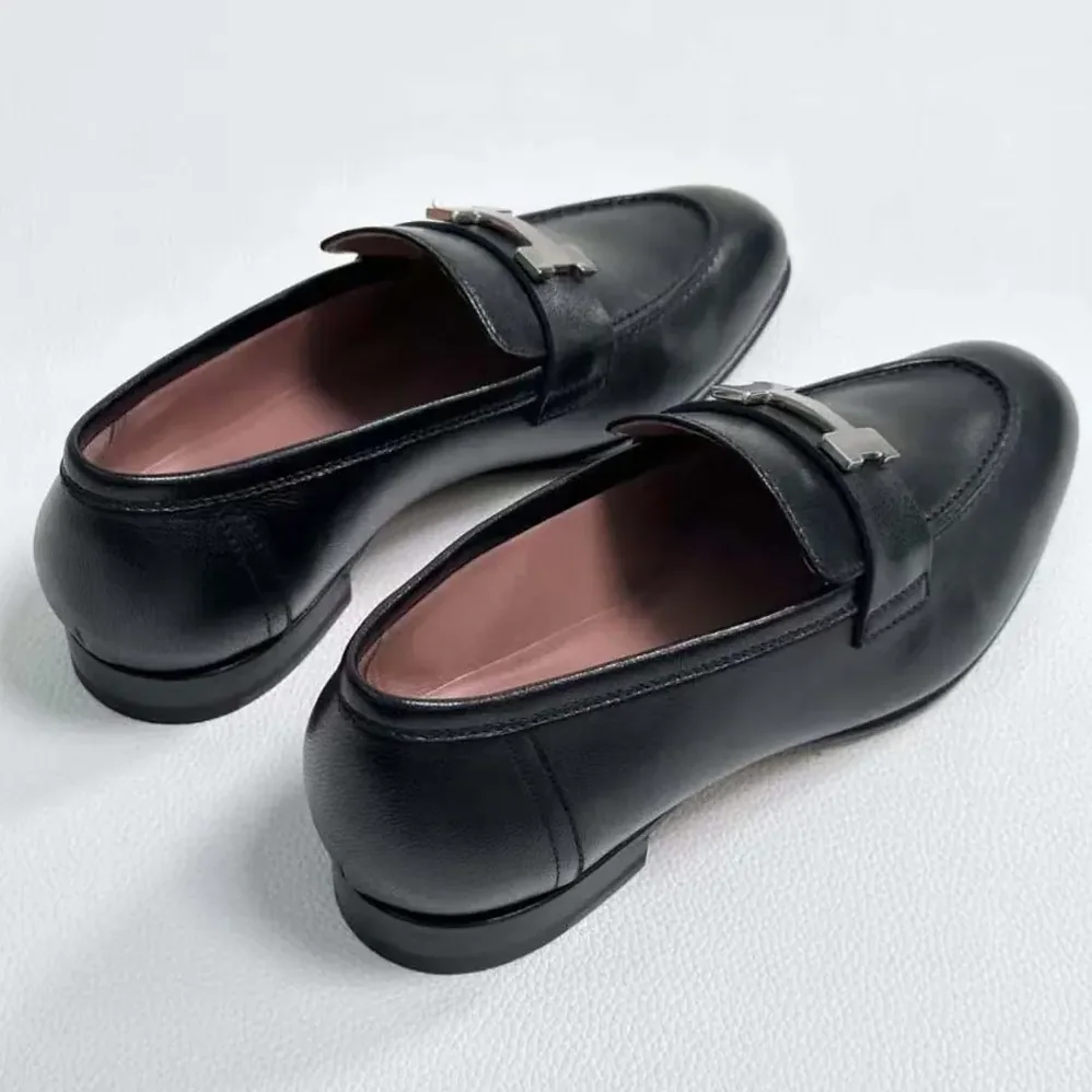 Hermes Loafer in Calfskin with Palladium Plated Signature “H” Detail for Men in Black Hermes Loafer in Calfskin with Palladium Plated Signature “H” Detail for Men in Black