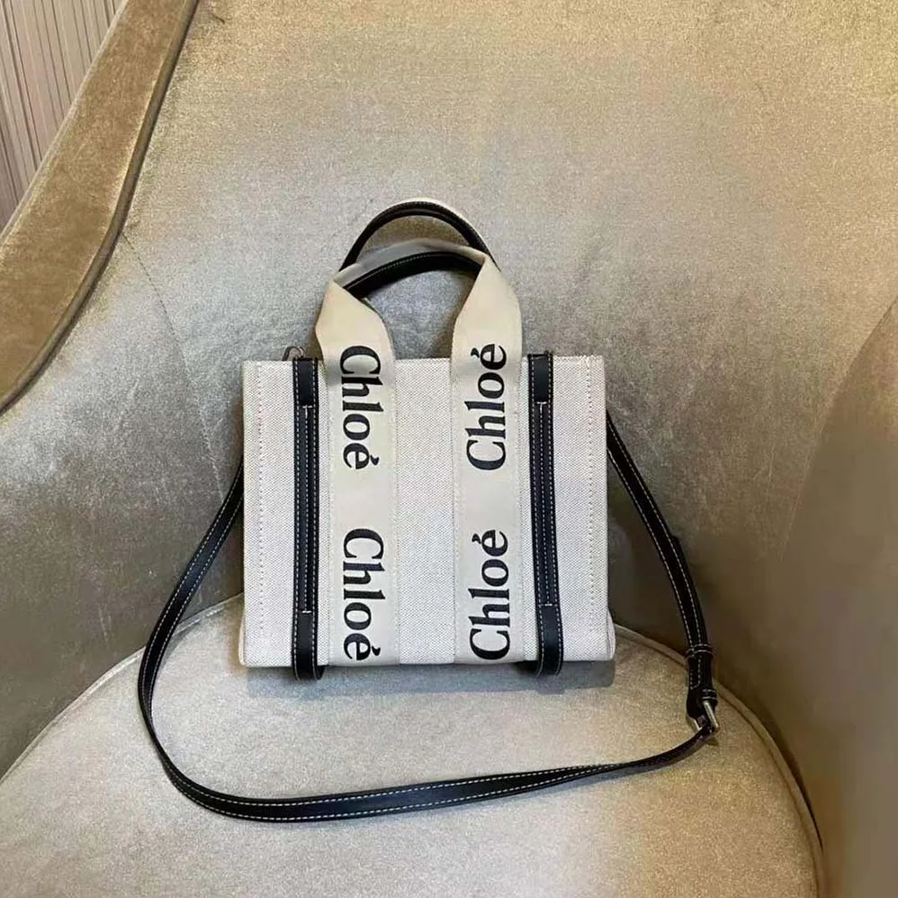 Chloe Small Woody Tote Bag in Cotton Canvas and Shiny Calfskin with Woody Ribbo for Women in Black Chloe Small Woody Tote Bag in Cotton Canvas and Shiny Calfskin with Woody Ribbo for Women in Black