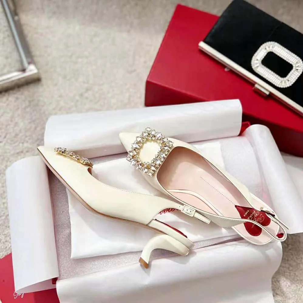 Roger Vivier Virgule Strass Buckle Slingback Pumps in Patent Leather for Women in White Roger Vivier Virgule Strass Buckle Slingback Pumps in Patent Leather for Women in White