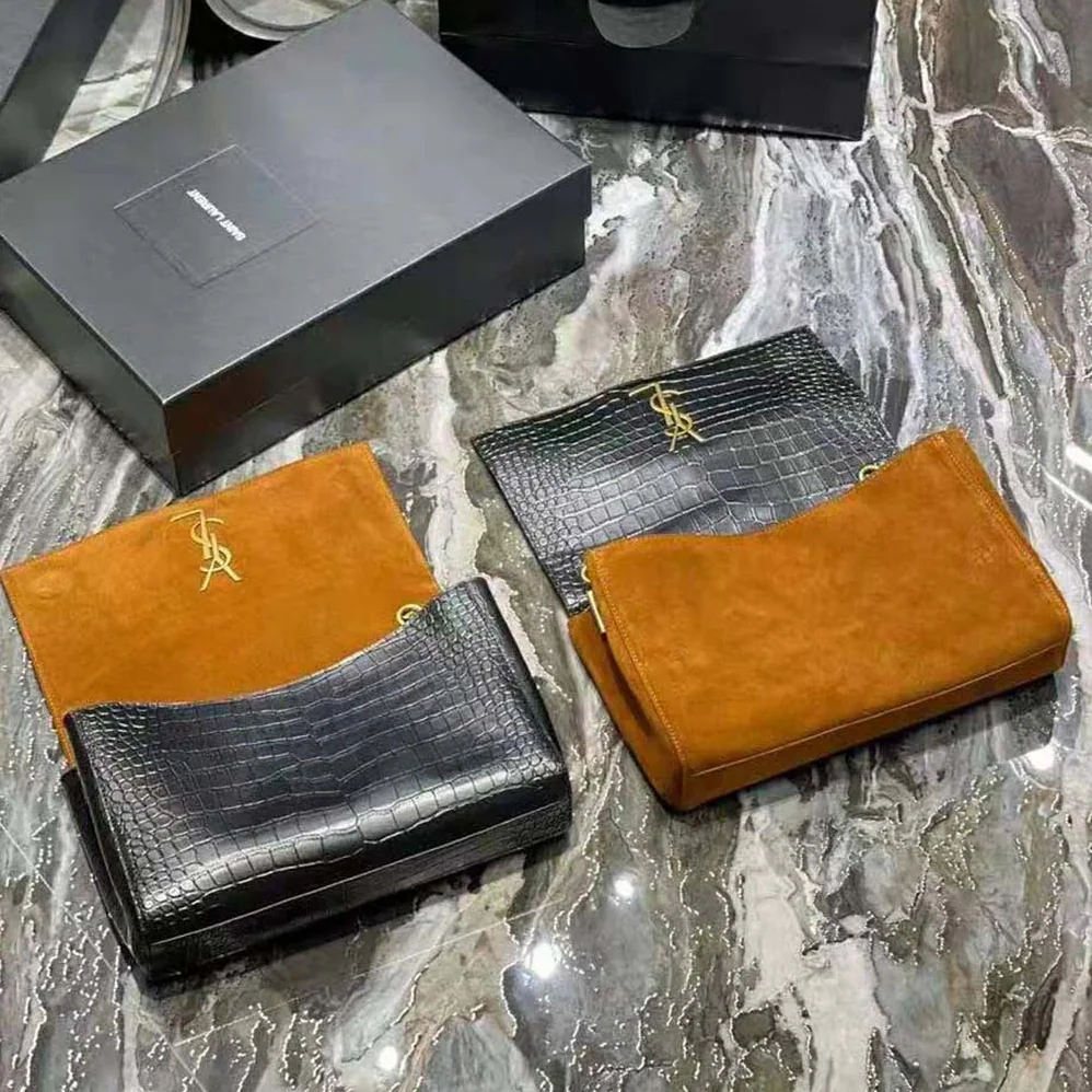 Saint Laurent YSL Kate Medium Reversible in Suede and Crocodile for Women in Embossed Leather Saint Laurent YSL Kate Medium Reversible in Suede and Crocodile for Women in Embossed Leather