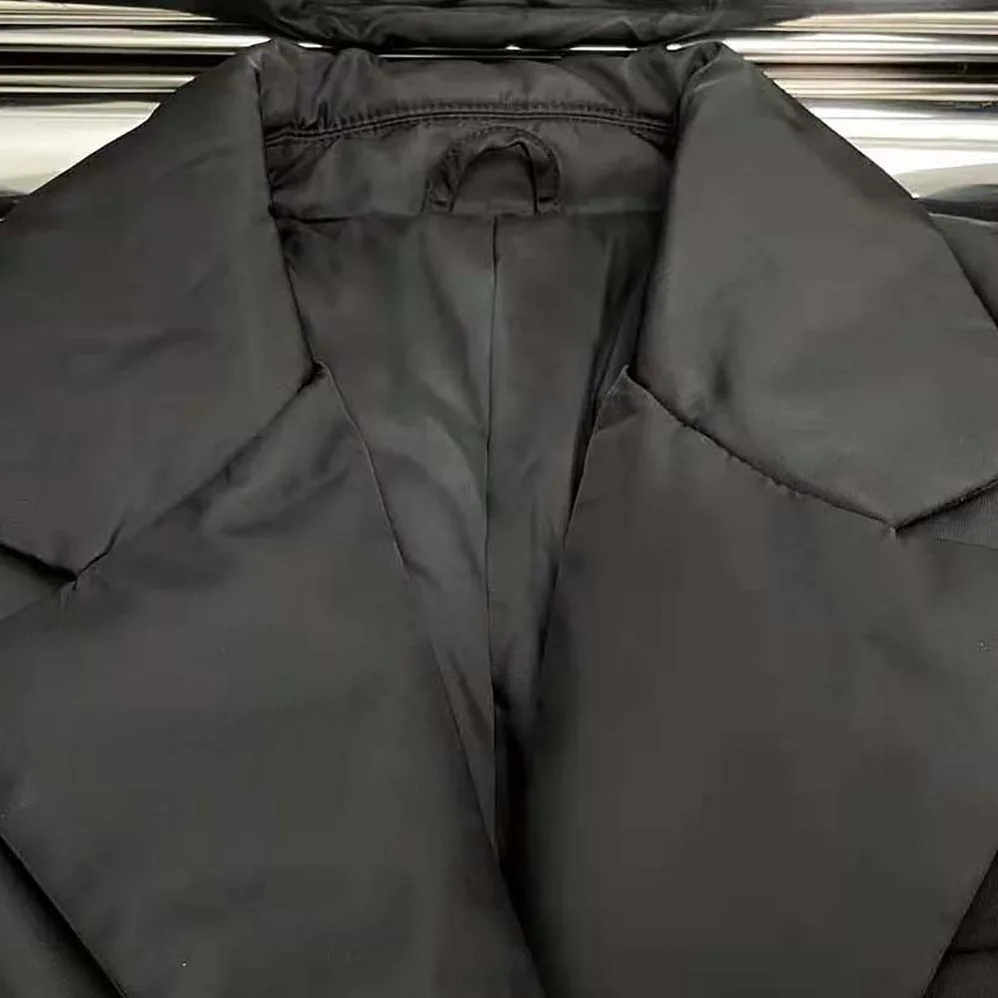 Prada Re-Nylon Down Coat with Enameled Metal Triangle Logo for Women Prada Re-Nylon Down Coat with Enameled Metal Triangle Logo for Women