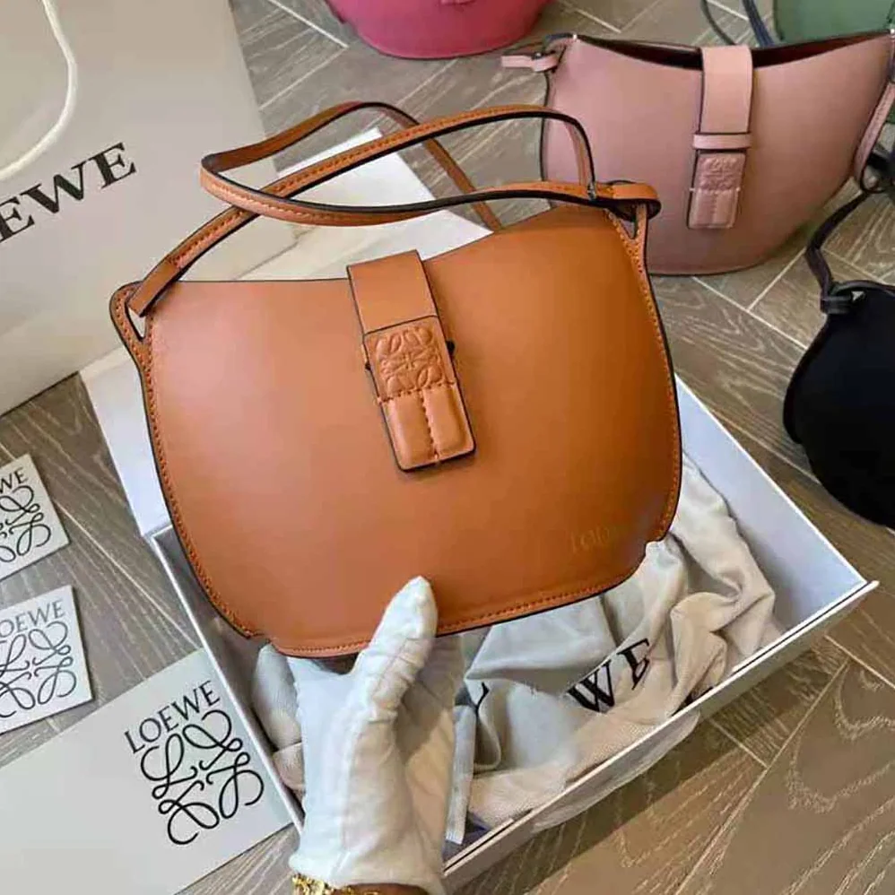 Loewe Moulded Bucket Bag in Calfskin for Women in Brown