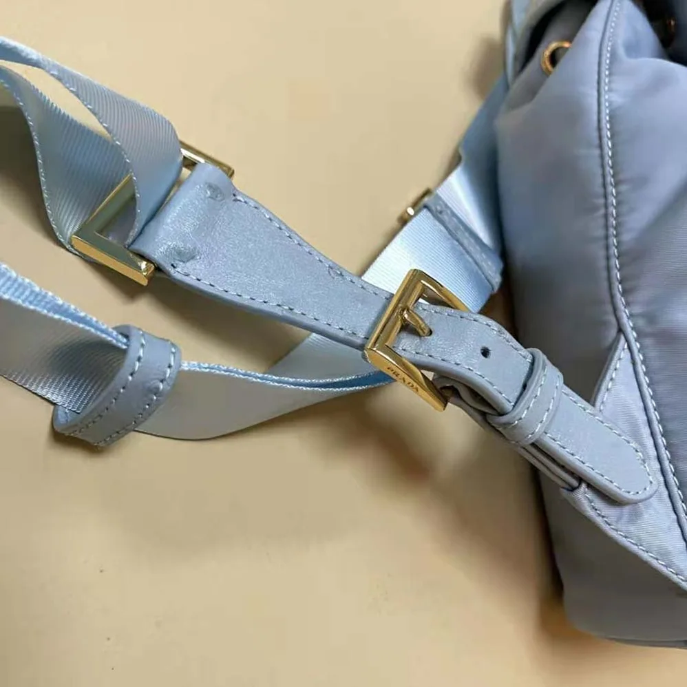 Prada Re-Nylon and Ostrich Leather Backpack for Women in Blue Prada Re-Nylon and Ostrich Leather Backpack for Women in Blue