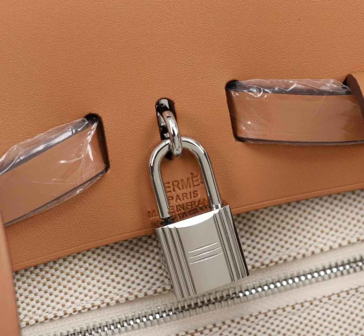 Hermes Buckle Lock Shape Striped Beige, Silver Toned Hardware Bag