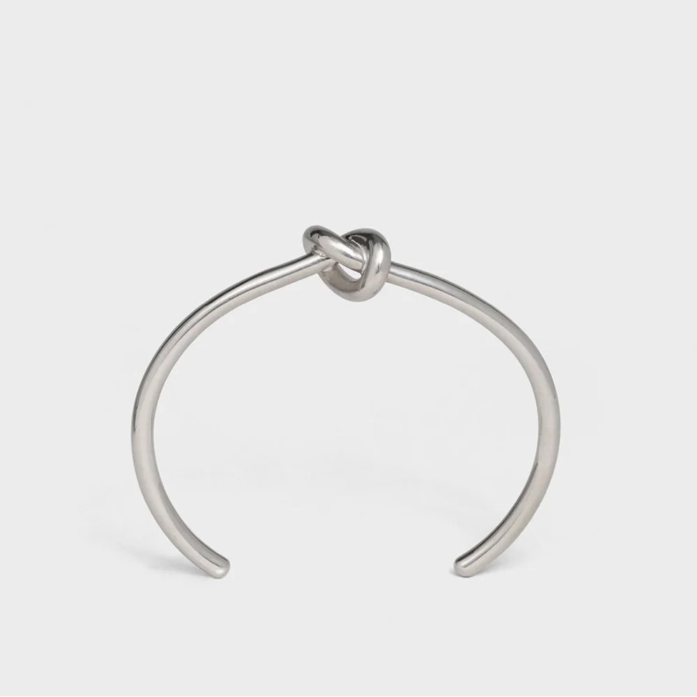 Celine Knot Extra-Thin Bracelet in Brass with Rhodium Finish for Women in Silver Celine Knot Extra-Thin Bracelet in Brass with Rhodium Finish for Women in Silver