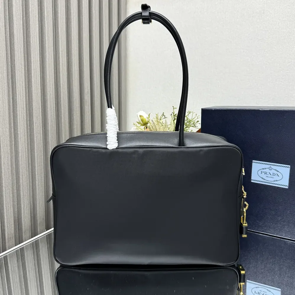 Prada Large Re-Nylon and Leather Top for Women in handle Bag with Padlock Prada Large Re-Nylon and Leather Top for Women in handle Bag with Padlock