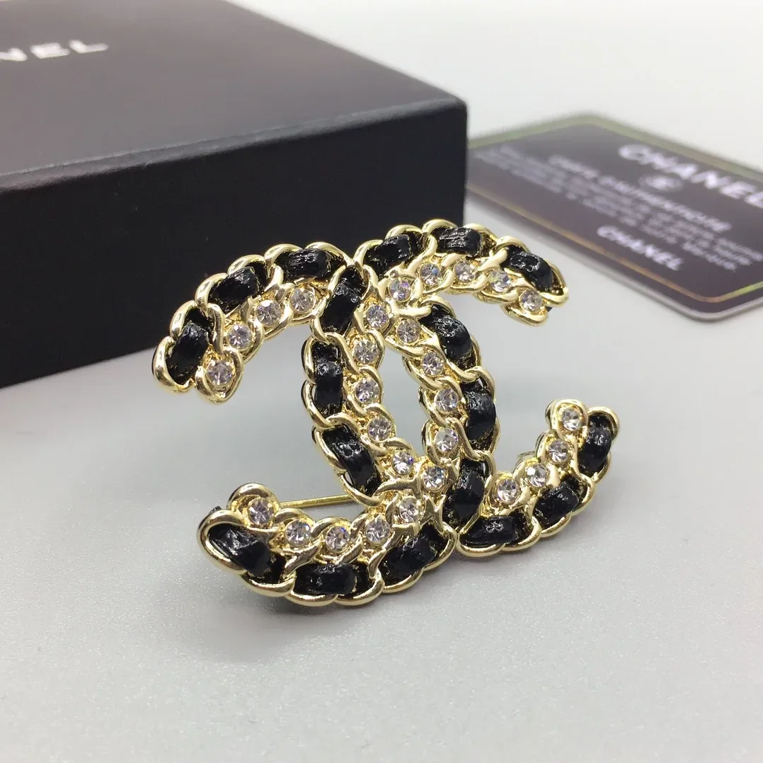 Chanel Brooch CC Logo Gold in toned