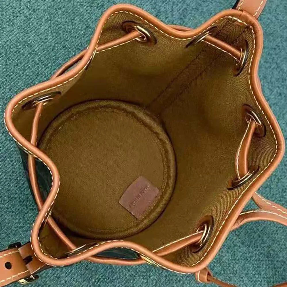 Celine Micro Drawstring in Triomphe Canvas and Calfskin for Women in Brown Celine Micro Drawstring in Triomphe Canvas and Calfskin for Women in Brown
